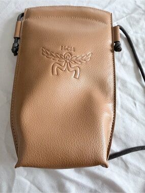 NEW MCM Tan Leather Embossed Logo Drawstring Crossbody Pouch